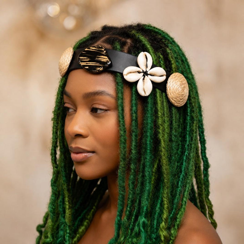 This black headband features natural decorative elements like wood pieces and shells for a chic bohemian-look or afrocentric style